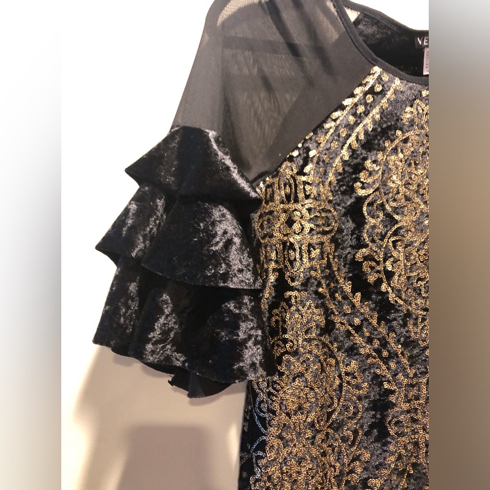 Black and gold midi dress with ruffle sleeves